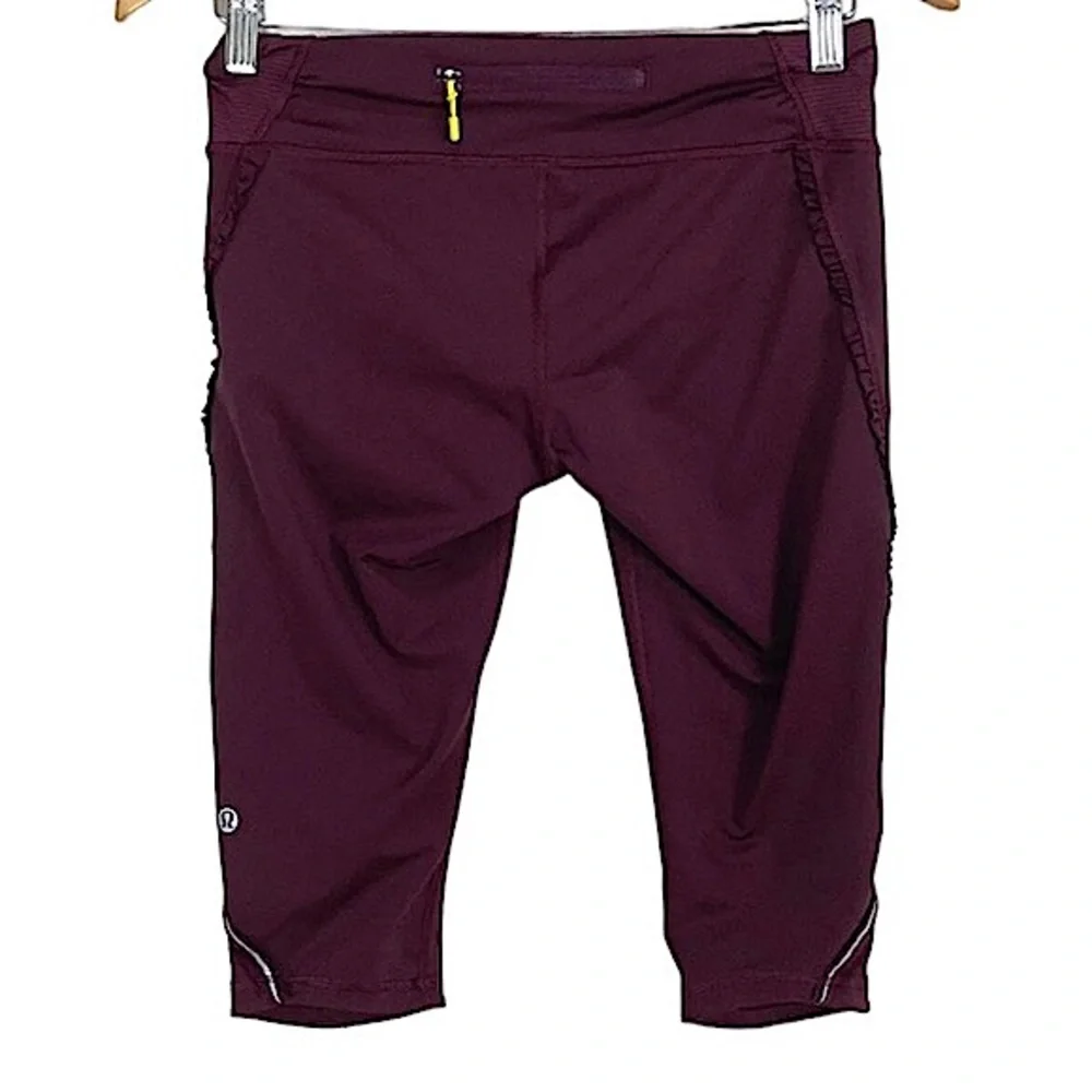 - Lululemon Sz 8 Tonka Ruffle Bordeaux Run Fast Free Crop Pants! EUC!